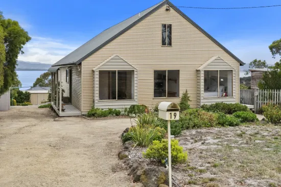 Welcome to 19 Franklin Street, Lewisham a home defined by space, natural light, and captivating water views.