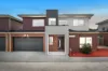 Contemporary Dual-Level Living with Stylish Finishes and Mountain Outlooks