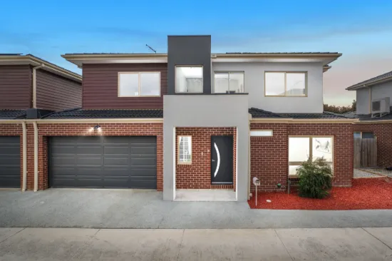 Contemporary Dual-Level Living with Stylish Finishes and Mountain Outlooks