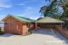 Deceptive, Incredibly Spacious Family Home with Spectacular City Views