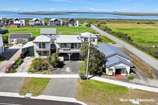 UNDER CONTRACT - CONTACT AGENT    Exceptional Waterfront Property with Income Potential