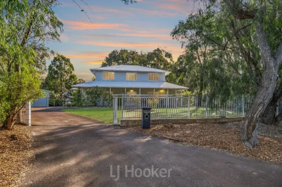 A Rare Half-Acre Lifestyle Estate Steps From Town  Renovated, Private & Perfect