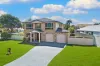 EXPANSIVE FAMILY RESIDENCE IN THE GOLDEN TRIANGLE!