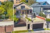 Dual-Level Home with Panoramic City Views & Possible Development Potential (STCA)