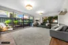 OVERSIZED GARDEN APARTMENT IN A PREMIER CENTENNIAL PARK LOCATION
