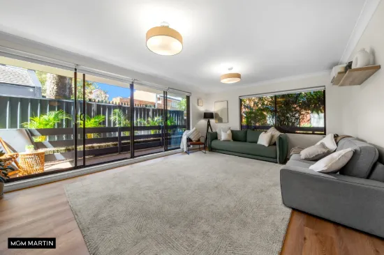 OVERSIZED GARDEN APARTMENT IN A PREMIER CENTENNIAL PARK LOCATION