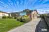 IMMACULATELY PRESENTED BRICK HOME