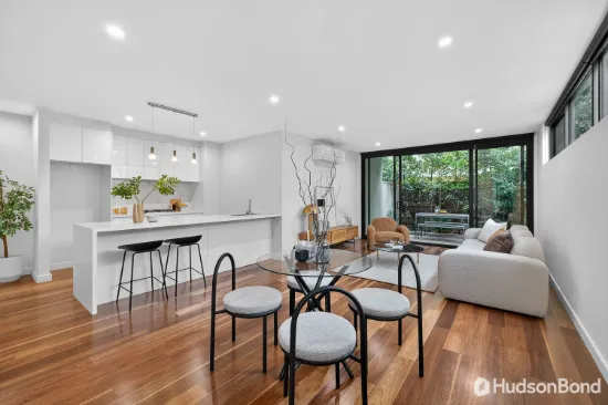 Oversized Two-Bedroom Apartment with Courtyard in Boutique Building