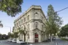 Contemporary Two-Level Residence in the Historic Railway Hotel Building