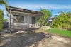 Updated Cottage Home with Rear Lane Access.