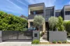 Refined Coastal Luxury Just Moments from the Beach