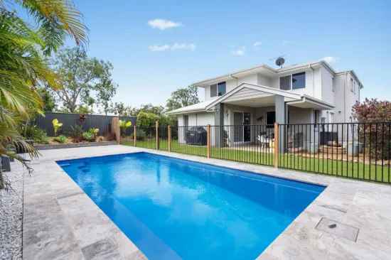 SPARKLING SWIMMING POOL AND CONTEMPORARY EASE IN CORNER BLOCK POSITION