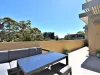 Well‑appointed split‑level residence with a generous wraparound terrace
