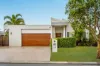DUAL MASTER SUITES AND SUPERB SIDE ACCESS PARKING OPTION