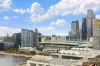 Modern Luxury Waterfront Living with Dual Balconies & City Views
