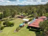 A country low set brick residence on five horse-friendly acres