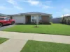NEAR NEW HOME ON GENEROUS QUARTER ACRE