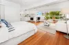 SUN DRENCHED STUDIO WITH HARBOUR BRIDGE & OPERA HOUSE VIEWS.