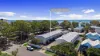 Coastal, Low Maintenance Living Just Steps from the Water