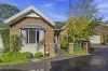 Single level brilliance with parklands and shopping steps away!