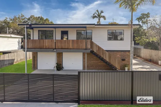 A Standout Property with the Ultimate Shed Setup!