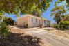 Great Value Home on an Elevated Very Spacious Block