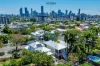 Calling Home Owners & Investors - Renovated two-in-one home with exceptional rental return!
