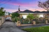 CHARMING OLDER STYLE HOME IN PRIME SUNSHINE LOCATION