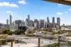 Sophisticated Riverside Living with Panoramic City Views