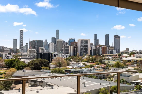 Sophisticated Riverside Living with Panoramic City Views