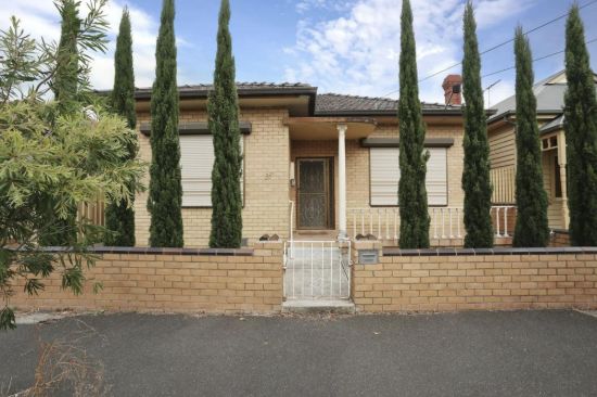 A well located double fronted home with laneway access.
