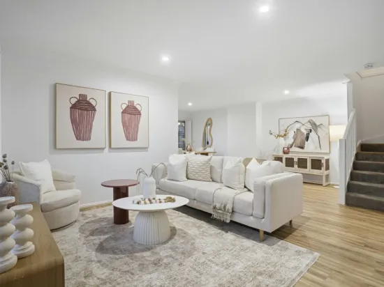 Refreshed, Gated, and Perfectly Positioned End-Unit Townhouse