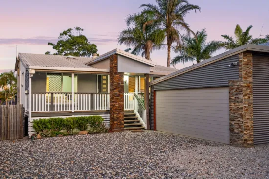 Breezy Bayside Living Three-Level Home Just Minutes from the Water