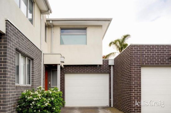 Up-scaled boutique living in a quiet and convenient low maintenance setting