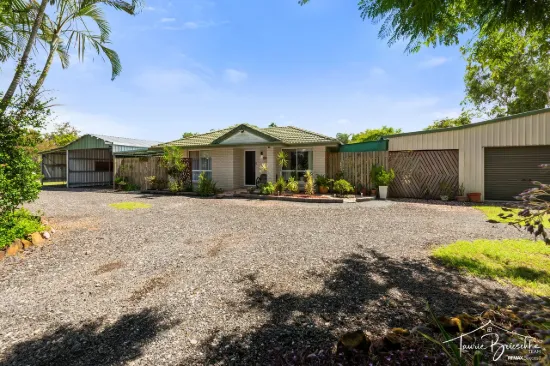 Tranquil Acreage Living with Modern Comforts