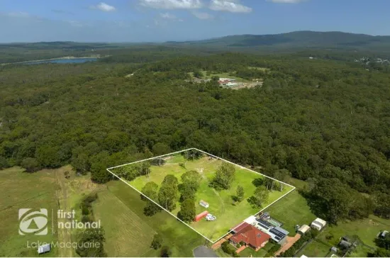 RARE ACREAGE IN SUBURBIA
