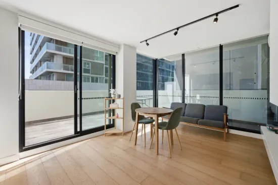 Wrap-Around Balcony Living in Prime Position Steps from Station