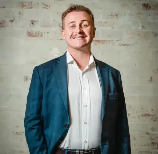 Tom Robinson - Real Estate Agent