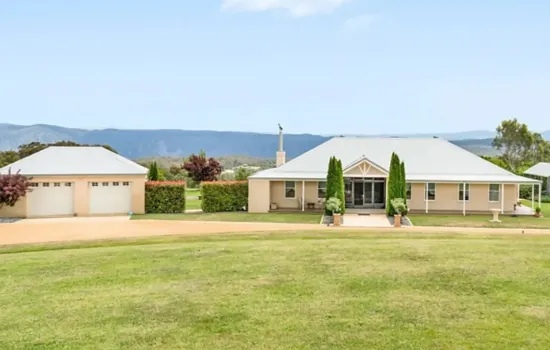 Majestic Mountain Views & Architectural Elegance on 140 Acres Plus Additional Renovated Cottage