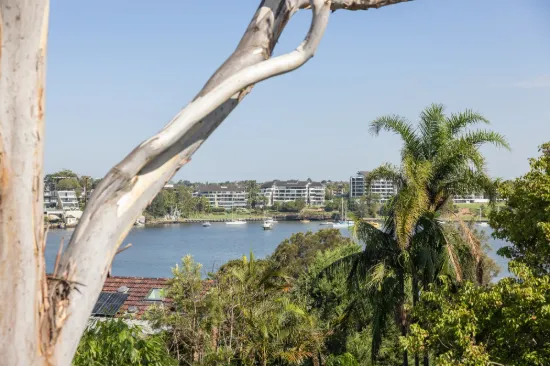 Water views - live now & enjoy or add value in waterside enclave.