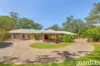 Supreme acreage living with long frontage