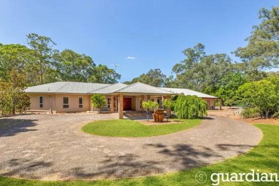 Supreme acreage living with long frontage