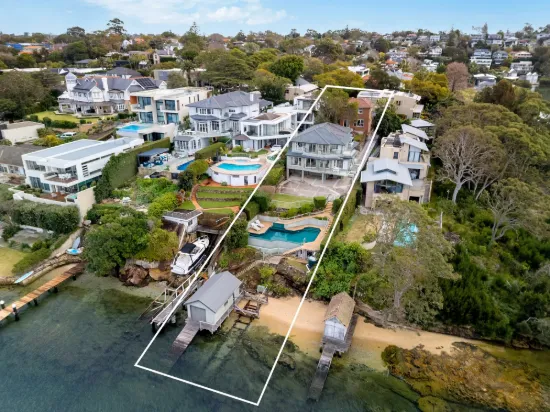 Two homes sold together or separately in prestigious waterfront pocket