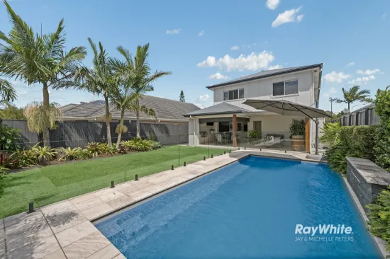 Elevated Coastal Living in Newport's Prestigious Community