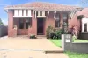 Solid Brick Home with Side Access & Studio Potential