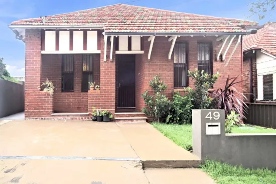 Solid Brick Home with Side Access & Studio Potential