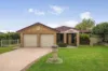 Well-Proportioned Living with a Beautiful Backyard Bonus