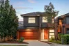 Modern Family Living with Dual Master Suites In Prime School Zone