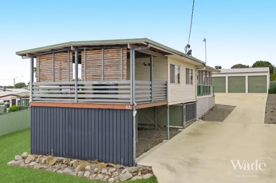 Versatile Elevated Home on 1,024m² with Huge Shed & Storage