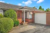 SPACIOUS TWO-BEDROOM UNIT WITH RARE WRAPAROUND YARD